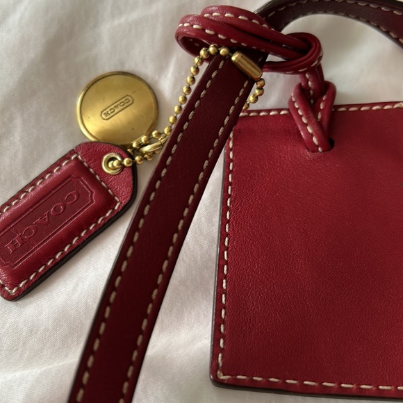 Authentic wine and brown monogram Coach shoulder bag. - Picture 2 of 10